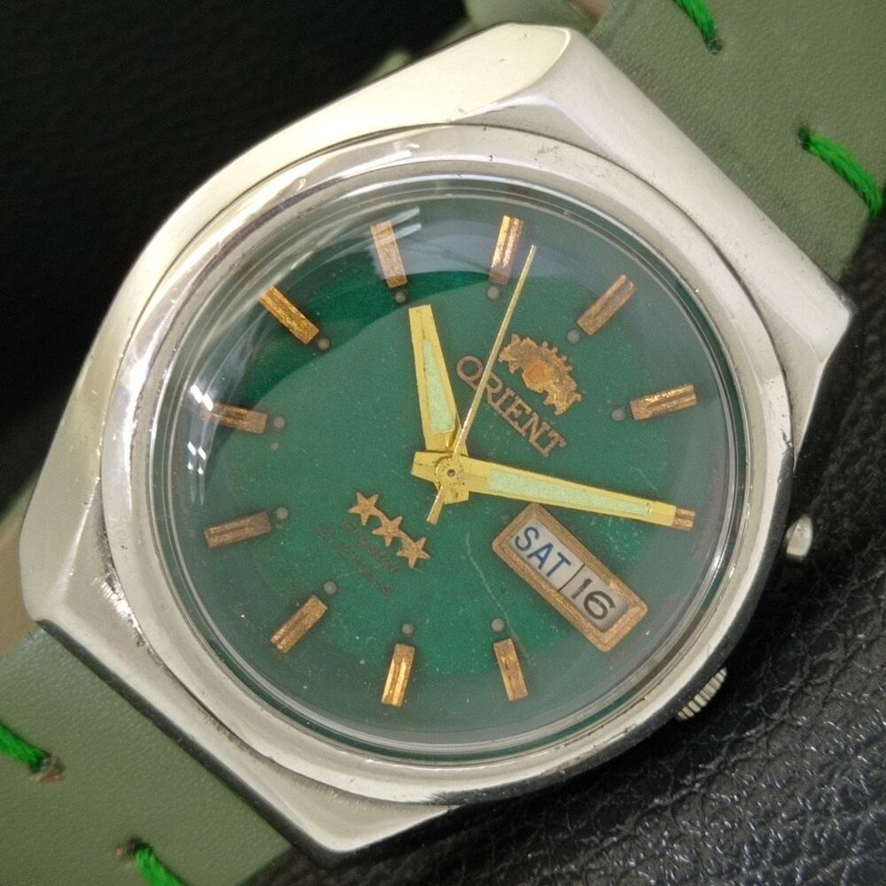 Vintage 1981 Orient Automatic Mens Silver Watch W/daydate & Green accents